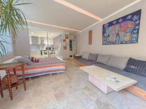 Studio d'artiste climatisée, proche plage